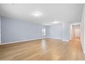 Bright, open living space with light wood floors, pale gray walls, and recessed lighting at 226 Clydesdale Cir, Summerville, SC 29486