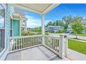 Exterior view from porch, showing a well-maintained street with houses and greenery at 2336 Brinkley Rd, Johns Island, SC 29455