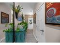 Inviting entryway with stylish decor, accent wall, and natural light, creating a warm welcome at 409 Grand Palm Ln, Summerville, SC 29485