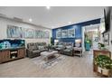 Open concept living room with stylish furniture, and contemporary decor perfect for relaxation at 409 Grand Palm Ln, Summerville, SC 29485