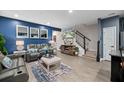 Comfortable living room featuring plush seating, modern decor, and a cozy atmosphere at 409 Grand Palm Ln, Summerville, SC 29485