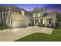 Inviting exterior showcasing a spacious driveway, attached garage, and covered front porch at 626 Chigwell Springs Ln, Summerville, SC 29486