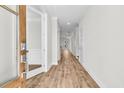 Bright hallway with wood floors and a glimpse of the interior, with natural light at 735 Maynard Ln, Summerville, SC 29486