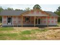 Exterior view of home under construction featuring a covered porch and a new roof at 1219 Pineville Cir, Pineville, SC 29468