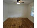 Bright bedroom with hardwood floors, a ceiling fan, and plenty of natural light at 1601 Westmoreland Ave, Charleston, SC 29412