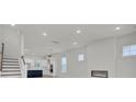 Open-concept living area with fireplace, kitchen island, recessed lighting, and neutral color palette at 3027 Robeson Trce, Johns Island, SC 29455