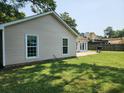 Spacious backyard with a patio area, perfect for outdoor entertaining and relaxation at 514 Woodward Blvd, Summerville, SC 29483