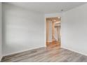 Bright living room showcasing wood floors, neutral paint and seamless flow into other living spaces at 724 Meadowbrook Ln, Summerville, SC 29486