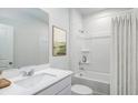 Bright bathroom features a shower-tub combo, sleek vanity, and a neutral color palette at 778 Meadowbrook Ln, Summerville, SC 29486