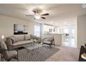 Inviting living room featuring neutral tones, stylish furnishings, and an open layout at 780 Meadowbrook Lane, Summerville, SC 29486