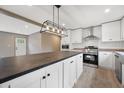 Modern kitchen with stainless appliances, an island, and white cabinetry at 106 Swanson Dr, Summerville, SC 29483