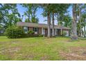 Lovely brick home with a well-maintained lawn, shade trees, and an inviting front entrance at 127 Cornell Dr, Ladson, SC 29456