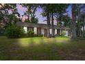 Lovely brick home with a well-maintained lawn, shade trees, and an inviting front entrance at 127 Cornell Dr, Ladson, SC 29456