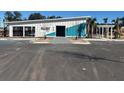 Hillcrest Club: a stylish building with blue accents, covered entryway, and modern architectural design at 2140 Macallan Blvd, Ravenel, SC 29470