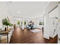 Open-concept living room featuring hardwood floors, and abundant natural light with lots of space at 2152 Pentland Dr, Charleston, SC 29412