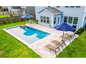 Aerial view of backyard pool with lounge chairs and manicured lawn at 256 Fiddleback Dr, Summerville, SC 29486