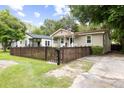 A charming fenced home with a yard and driveway at 2924 Alabama Dr, North Charleston, SC 29405