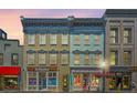 Beautiful boutique commercial property with well-maintained facade and sidewalk flower display at 338 King St # C, Charleston, SC 29401