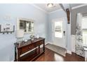Welcoming foyer with hardwood floors, neutral paint, and stylish decor at 415 True North Trail, Summerville, SC 29486