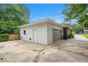 Detached two car garage with extra space on a concrete pad at 1833 St Julian Dr, Charleston, SC 29407