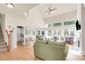 Spacious living room with hardwood floors, fireplace, and ample natural light at 2791 Gaston Gate, Mount Pleasant, SC 29466