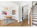 Bright, naturally lit home office with hardwood floors, modern decor, and a cozy rug at 2828 Wagner Way, Mount Pleasant, SC 29466