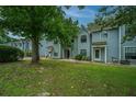 Charming townhomes featuring light blue siding, and grassy lawns at 1686 Hunters Run Dr, Mount Pleasant, SC 29464
