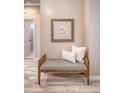 Comfortable foyer bench with stylish throw pillows, perfect for welcoming guests at 1800 Palmetto Isle Dr, Mount Pleasant, SC 29466