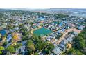 Stunning aerial view of a waterfront community with lush green landscape and pond at 2257 Magnolia Meadows Dr, Mount Pleasant, SC 29464