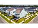 Charming two-story home featuring a covered porch and well-maintained landscaping at 312 Clearpath Dr, Summerville, SC 29486