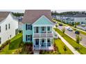 Inviting two-story home with a covered porch, offering curb appeal and charm at 312 Clearpath Dr, Summerville, SC 29486