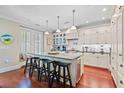 Spacious kitchen boasts a large island, seating, and stainless steel appliances at 6002 Green Dolphin Way, Kiawah Island, SC 29455