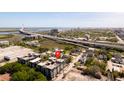 Aerial view of condo in Charleston, SC, with nearby bridge and freeway at 1 Cool Blow St # 124, Charleston, SC 29403