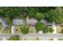 Aerial view of a home with mature tree coverage and driveway at 1002 Sea Gull Dr, Mount Pleasant, SC 29464