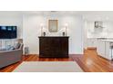 Bright living room featuring hardwood floors, stylish furniture, and neutral paint at 1408 Goblet Ave, Mount Pleasant, SC 29464