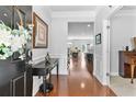 Elegant foyer with hardwood floors and an open view into the adjacent living spaces at 255 Decatur Dr, Summerville, SC 29486