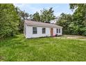 A cozy home with a brown roof, complemented by a surrounding lawn at 3043 Matipan Ave, North Charleston, SC 29405