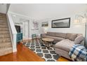 Inviting living room with a sectional sofa, modern decor, and hardwood floors at 507 Stinson Dr # B3, Charleston, SC 29407