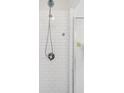 Modern shower showcases white subway tiles and sleek chrome fixtures, creating a clean and contemporary feel at 801 Ventura Pl, Mount Pleasant, SC 29464