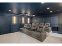 Comfortable home theater equipped with reclining seats, cup holders, and a projector for an immersive viewing experience at 2225 Black Oak Ct, Mount Pleasant, SC 29466