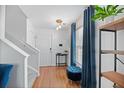 Bright entryway with hardwood floors and a view of the staircase at 3506 Galaxy Rd, Ladson, SC 29456