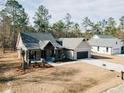 Beautiful single-story home with manicured lawn and attractive exterior, showcasing modern design and curb appeal at 54 Summer Dr, Walterboro, SC 29488
