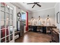 Bright home office with built-in desks, stylish decor, and ample natural light at 154 Calm Water Way, Summerville, SC 29486