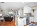 Open kitchen concept flows into the living room offering bright lighting and stainless steel appliances at 2011 N Highway 17 # 1400A, Mount Pleasant, SC 29466