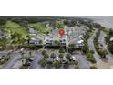 Community aerial view with parking, golf course, and landscaped grounds at 2942 Atrium Villa Dr # 42, Johns Island, SC 29455