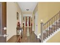 Inviting entryway with wood floors and staircase, creating a warm and welcoming atmosphere at 466 Gianna Ln, Goose Creek, SC 29445