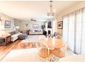 Open-concept living area showcasing a fireplace and comfortable seating at 9229 N Moreto Cir, Summerville, SC 29485