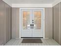 Inviting entryway featuring a double front door with decorative glass panels at 1061 Law Ln, Mount Pleasant, SC 29464