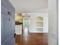 Inviting entryway with hardwood floors leading to kitchen and living area at 1300 Park West Blvd # 822, Mount Pleasant, SC 29466