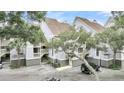 Well-maintained exterior showcasing updated landscaping and convenient parking at 250 Little Oak Island Dr, Folly Beach, SC 29439